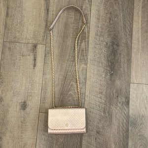 Tory Burch Rose Gold cross body purse with gold hardware.